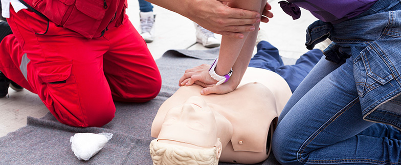 Taking a CPR class and learning proper technique.