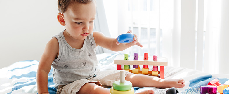 Child playing with larger blocks.